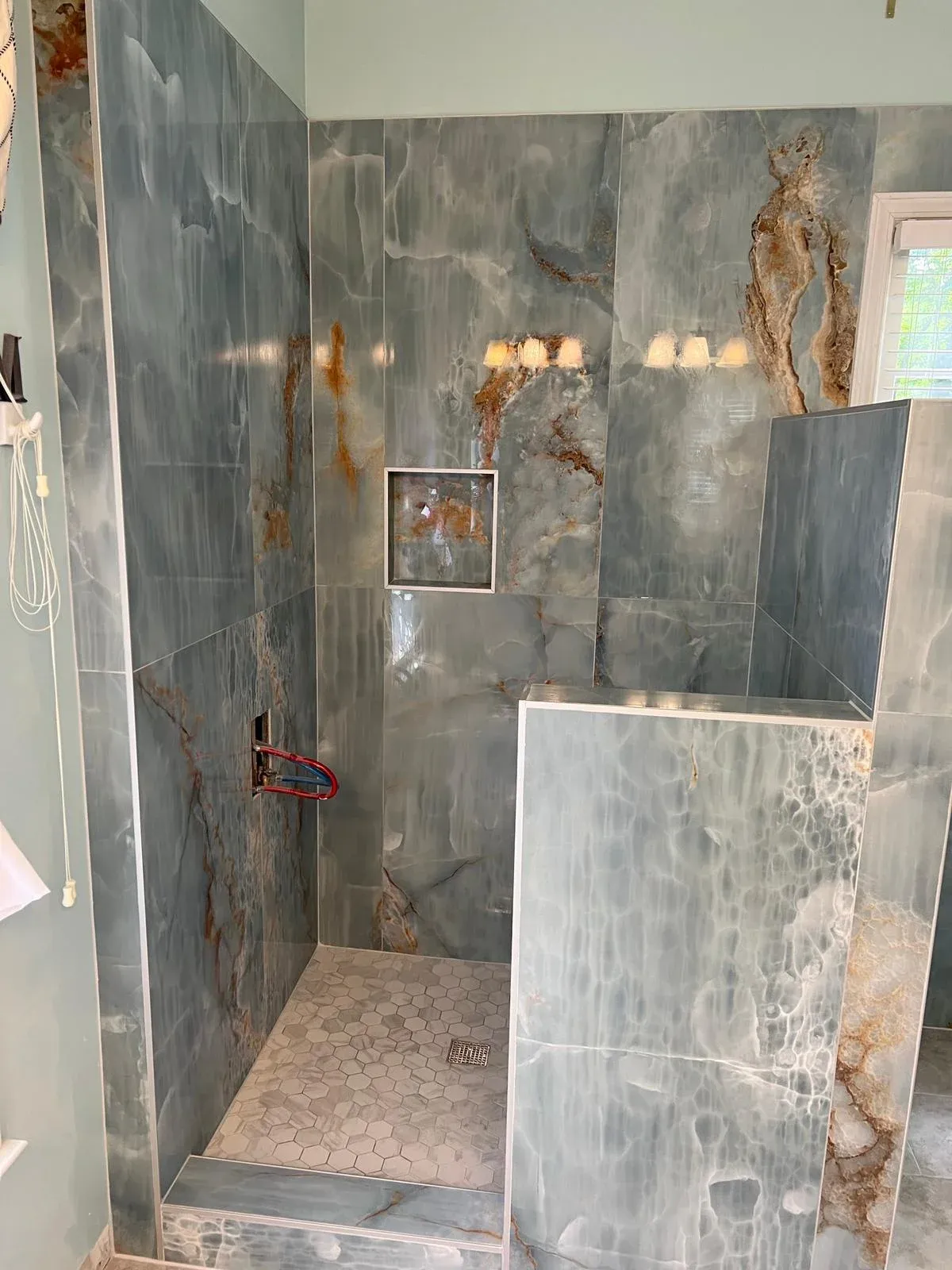 Grey marble shower, mid-build