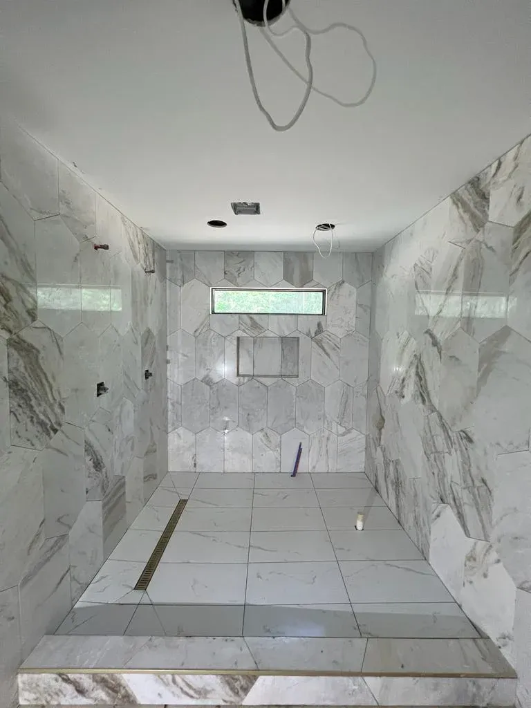 Large-format marble wet room