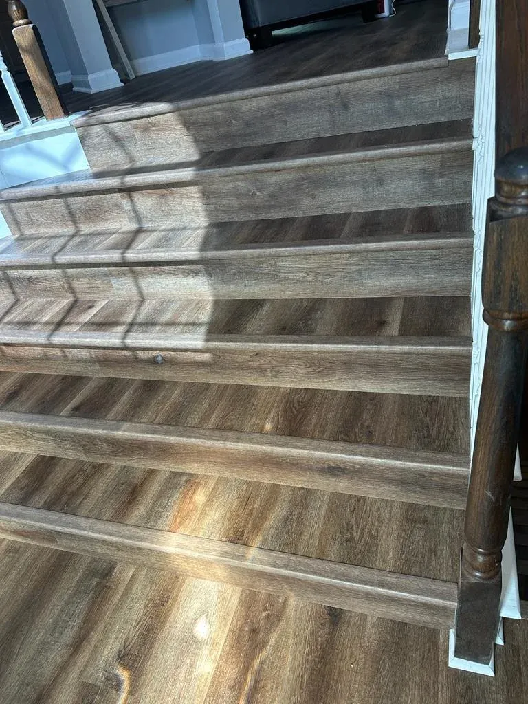 Stone-look treads on a turning stair